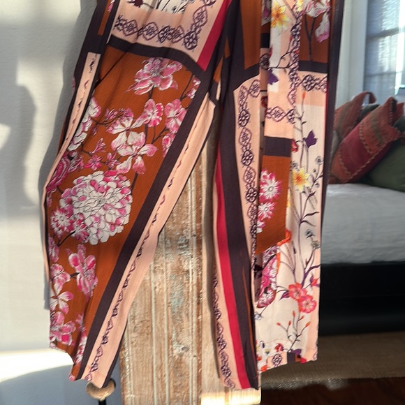 Jumpsuit in rust, brown, cream and splashes of yellow, orange & red flowers. - Picture 6 of 7